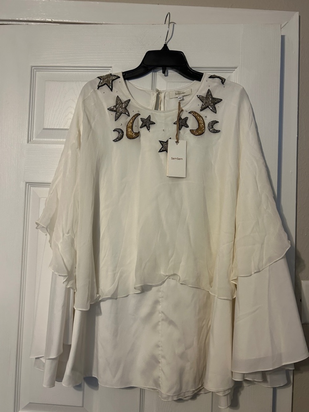 New SemSem embellished cape
